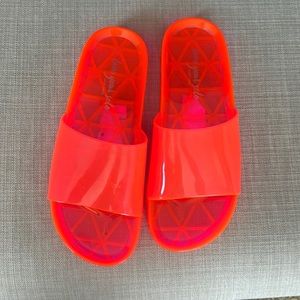 Neon pink/orange slides